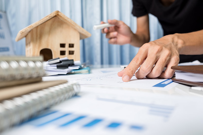 A Colorado Springs title agent going over the terms of a new home purchase.