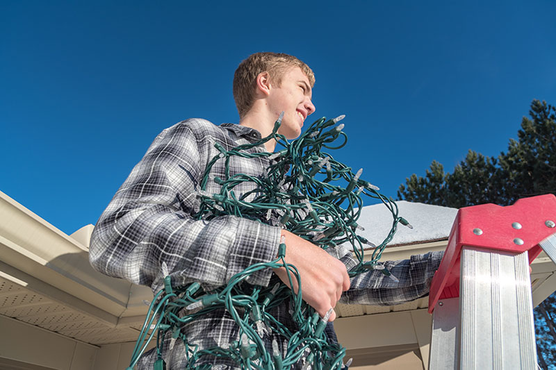 Tips for safely putting up Christmas lights on your new home.