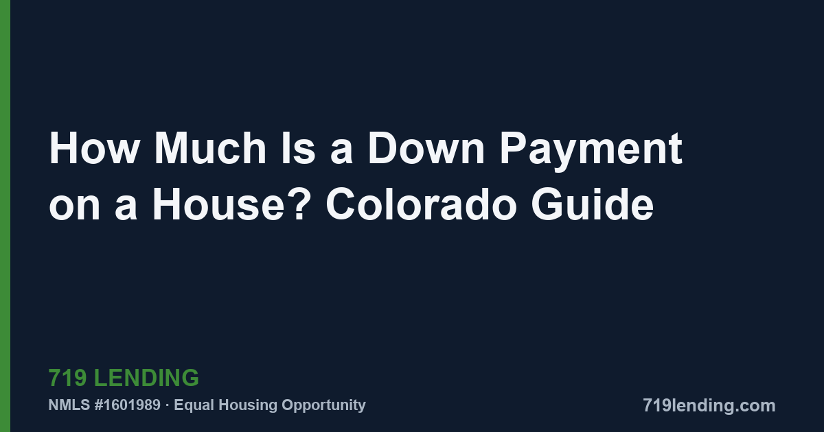 Couple reviewing down payment savings and loan options at a kitchen table in Colorado Springs